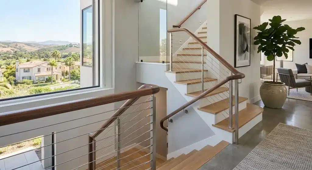 Modern cable stair handrail with open sightlines in a Mission Viejo home
